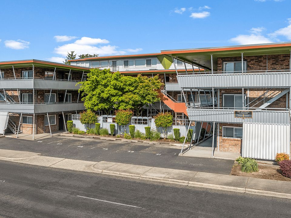Mid-century modern apartment complex with available units for rent.