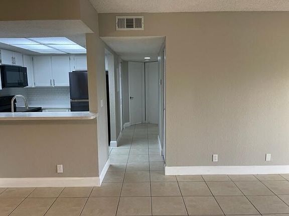 2nd image of 1508 SE Royal Green Cir APT E205