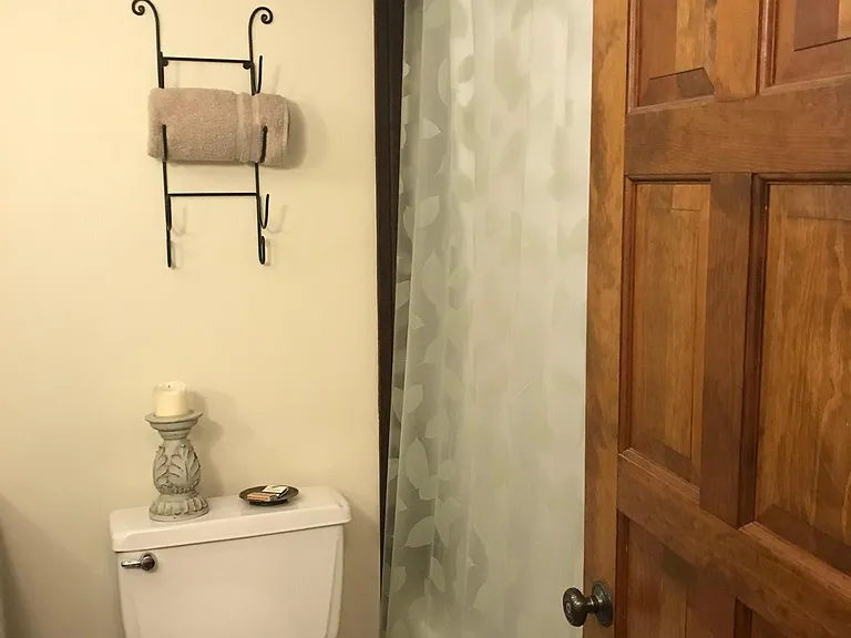 Bedroom 2 en-suite bathroom tub and shower