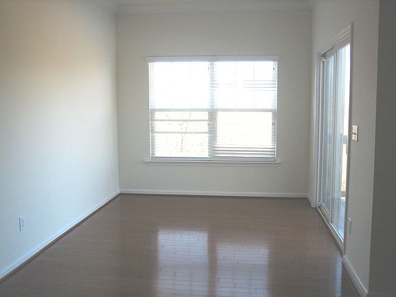 Sunroom or dining room...you decide!  Has hardwoods and opens onto deck