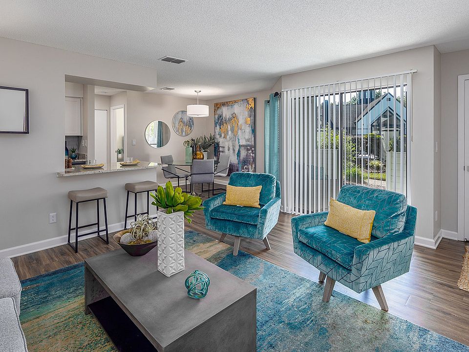 Spacious living room with hardwood-style flooring
