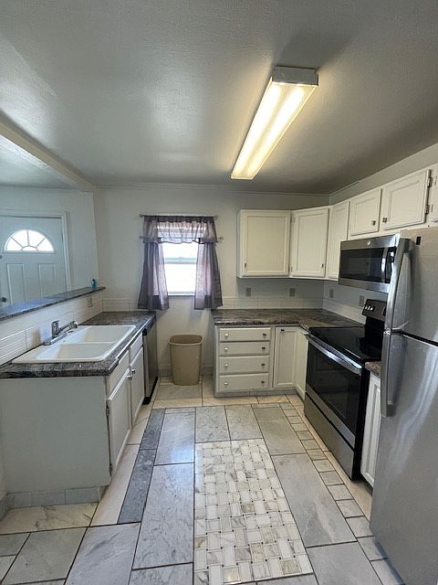 Fully stocked kitchen.