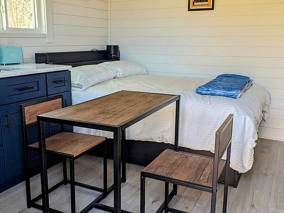 Moveable table with two chairs