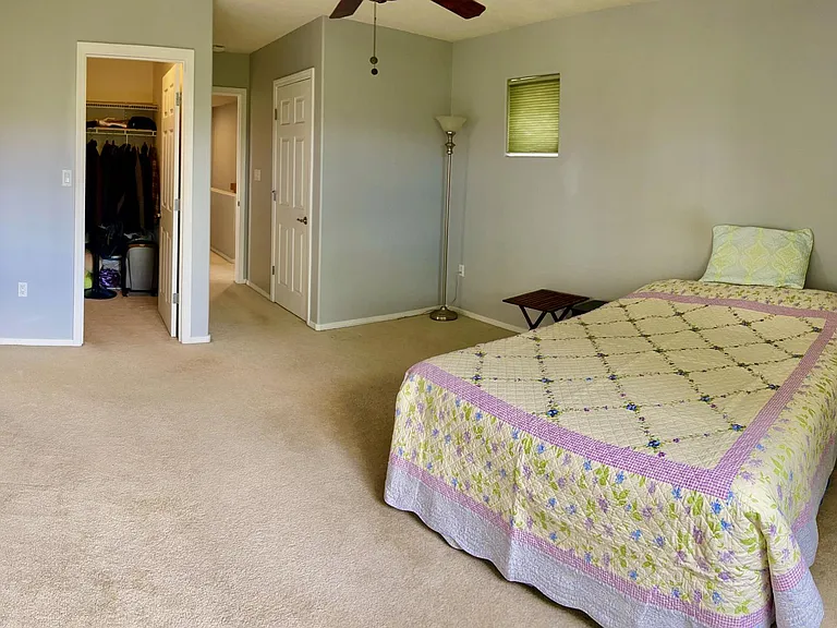 Master bedroom with 2 walk-in closets