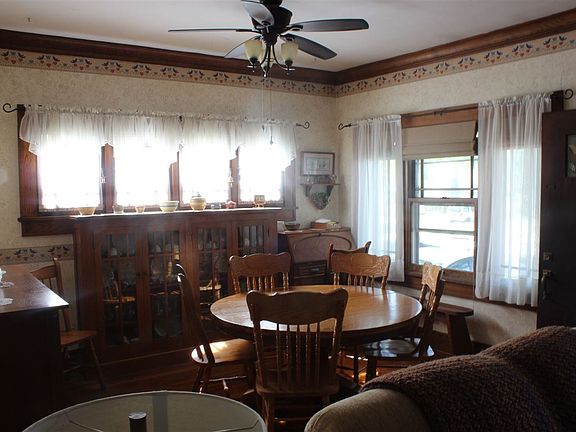 ...the hardwood floors and woodwork continue into the Dining Room...
