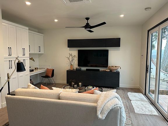 Living Room with 65" TV with Surround Sound