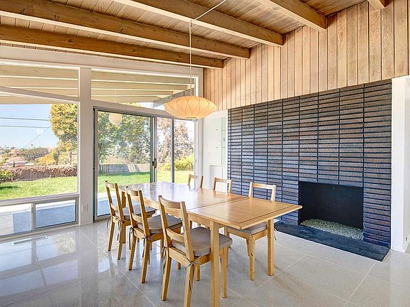 Sunny dining space w/fireplace