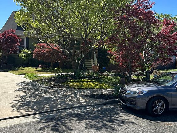 Beautifully landscaped homw with irrigation.