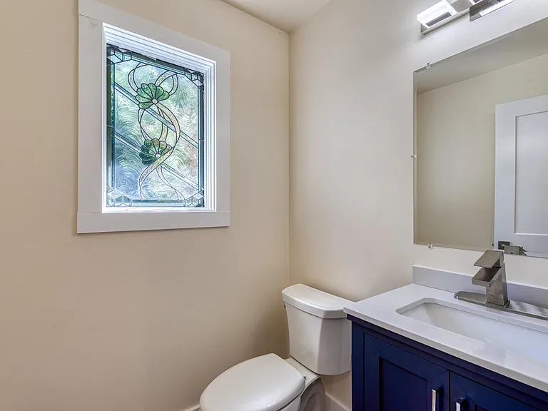 Powder room on the 1st floor hallway