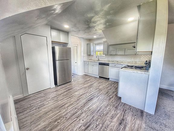 Large eat-in kitchen with huge walk in pantry.