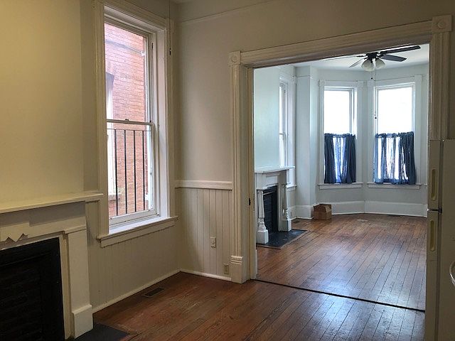 Open flowing kitchen/living room. Secret pocket doors to close off to create private room.