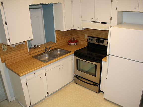 cute kitchen with stainless oven