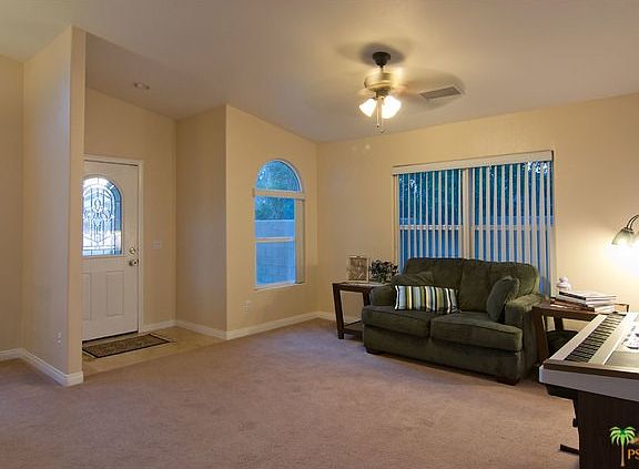 Large formal living room with adjacent formal dini