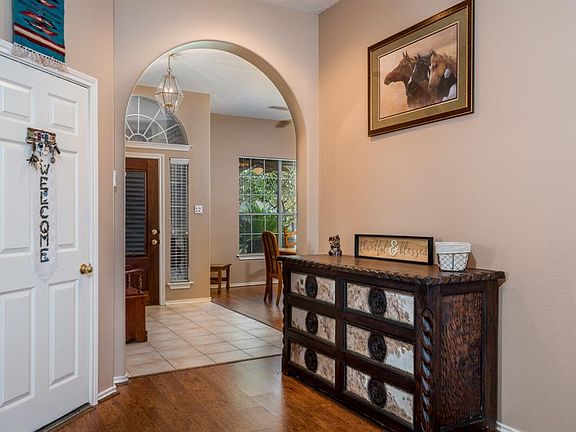 View of front door from living room