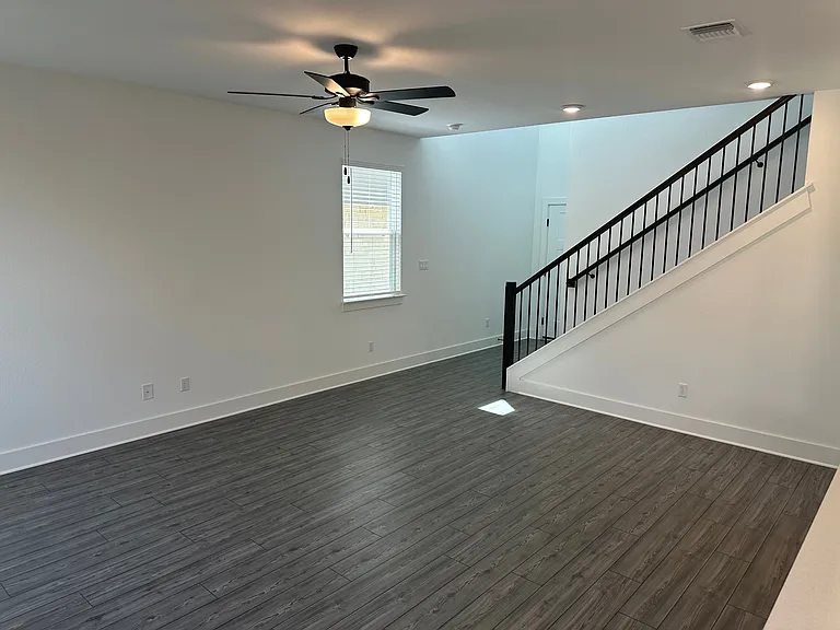 Living area with hard tile flooring