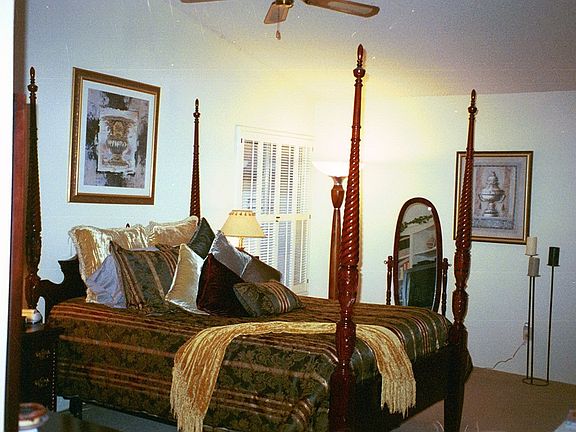 Bedroom w/ Plantation Shutters