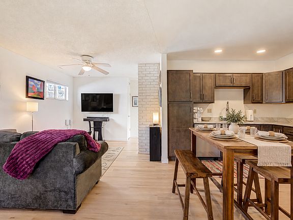 Kitchen / Living Room

This updated 2-bedroom, 1-bath home sleeps 4 and includes utilities, excellent Wi-Fi, two workspaces, full-size laundry, and a private fenced backyard.