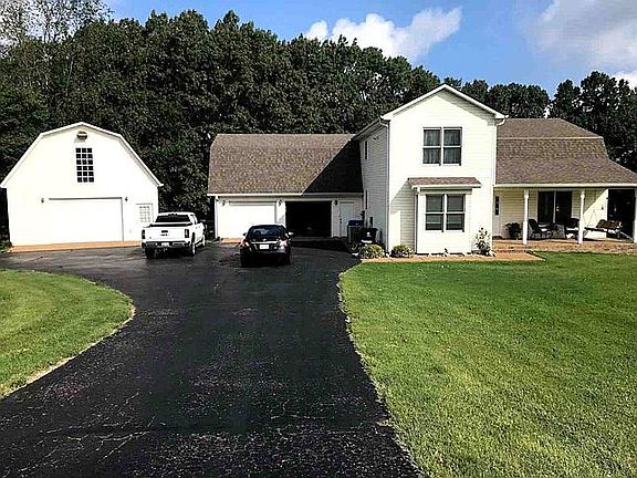 Front of house,paved drive