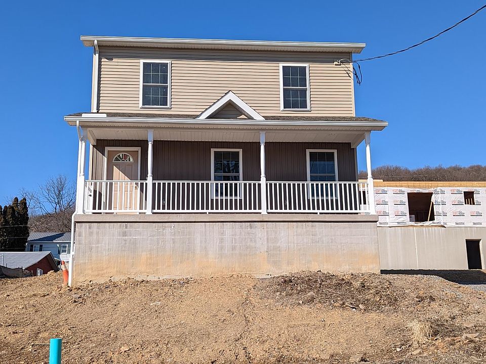 Grass, landscaping, rear deck, and paving will all be done in the Spring.