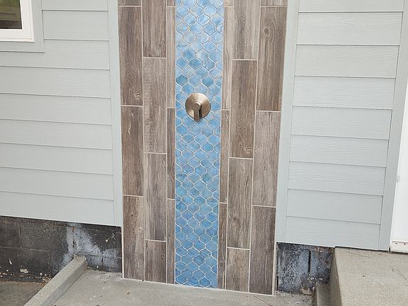 Outdoor shower w/ hot and cold water