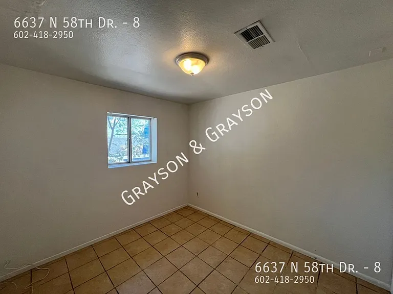 6637 N 58th Dr — Photo 5
