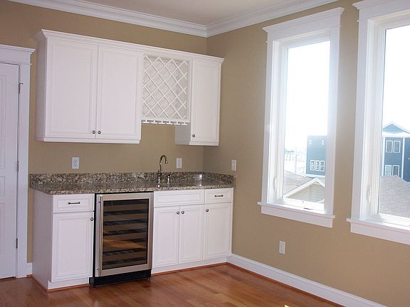 Media room with wet bar, wine coller