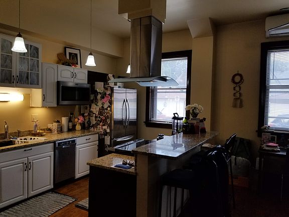 Large, full height windows brighten the day with plenty of sunshine.