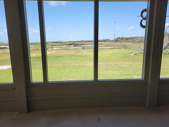 Screened in back porch view