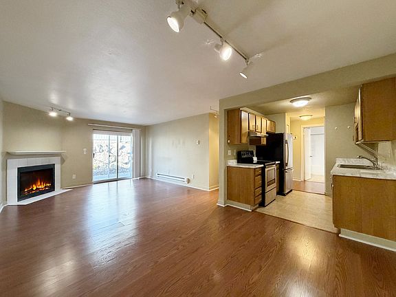View of Living, Dining rooms and kitchen