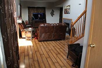 Living rm with gas burning fireplace, 9ft ceilings