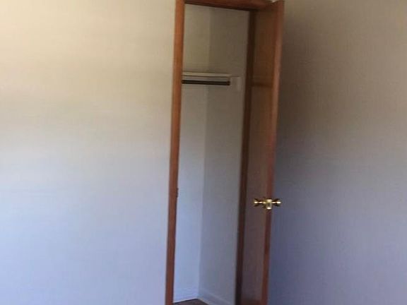 Living area coat closet.