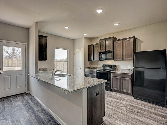 Enjoy other incredible upgrades such as recessed lighting and gorgeous wood-style flooring