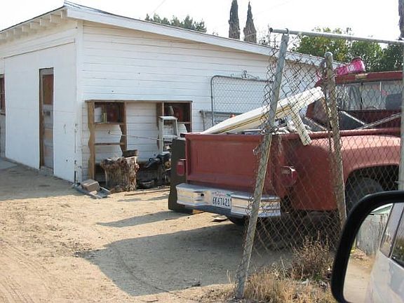 Storage area behind shop/garage