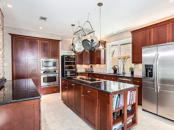 Chef's kitchen with the finest KRAFTMAID cabinetry drawer pullouts with soft close.  WOLF Cooktop with down draft venting to the exterior.