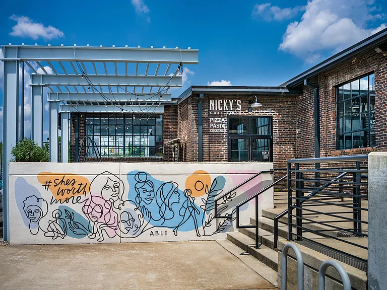 Savor wood-fired pizza at Nicky's Coal Fired_just steps from Modera Nations in your vibrant new neighborhood.