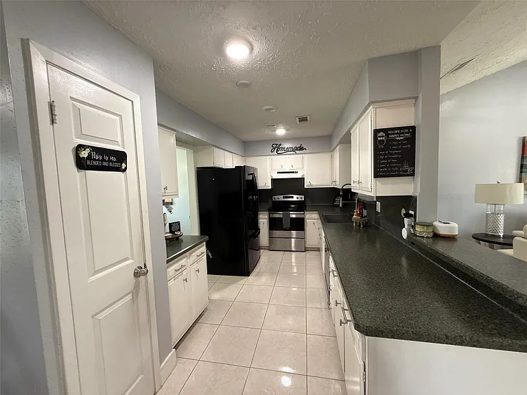 7307 Muirwood Ln — Photo 13