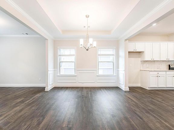 The Devon II plan features a formal dining room off the kitchen for supreme livability. This floorpl