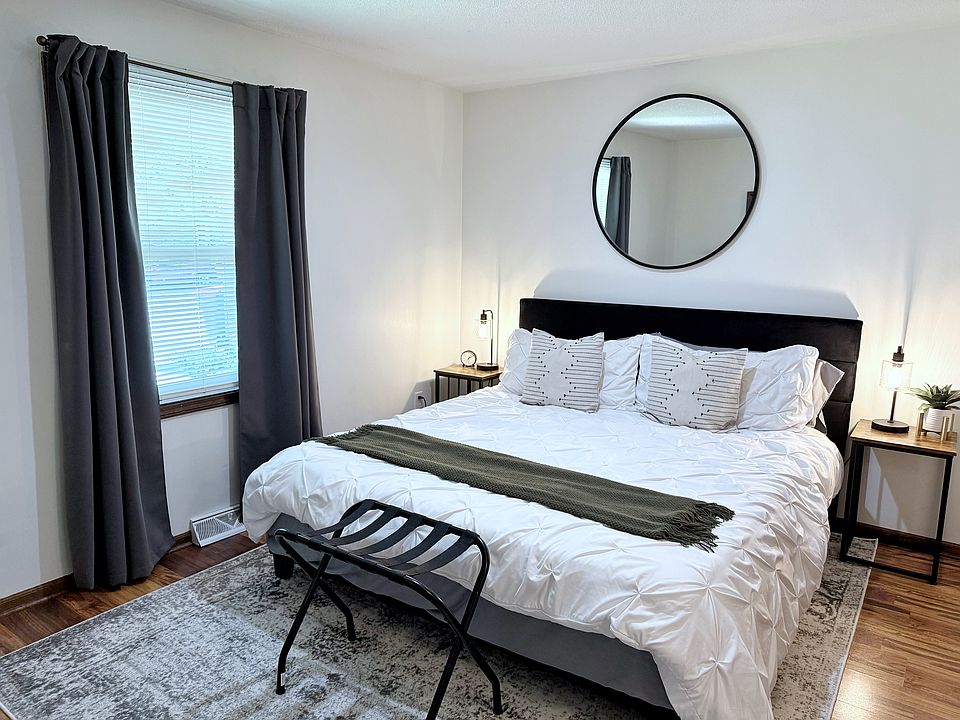 Bedroom 1 Featuring King Bed w/ Plush Bedding
