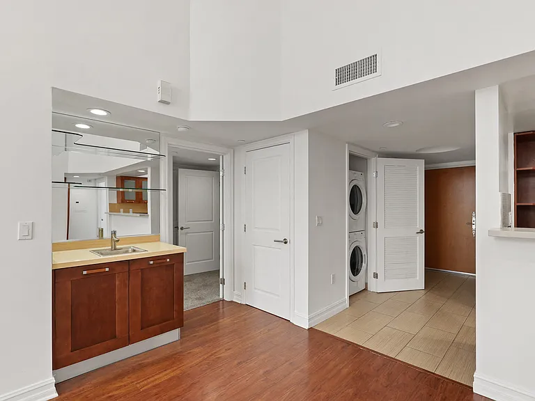 Wet Bar, In-Suite Washer & Dryer, and Hardwood Flooring