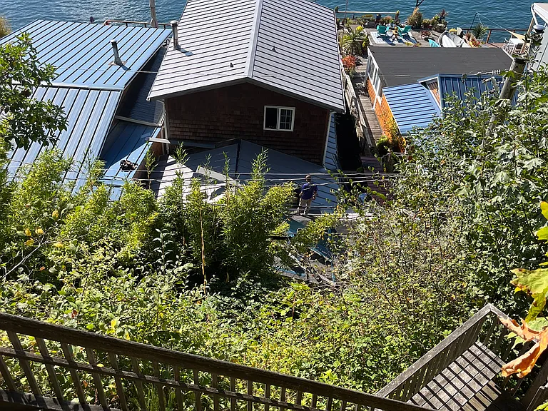 The staircase down to the homes on pilings.