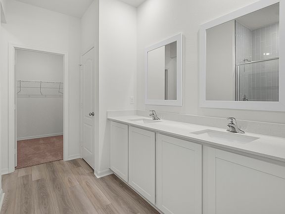 Dual sink vanity in the master bathroom