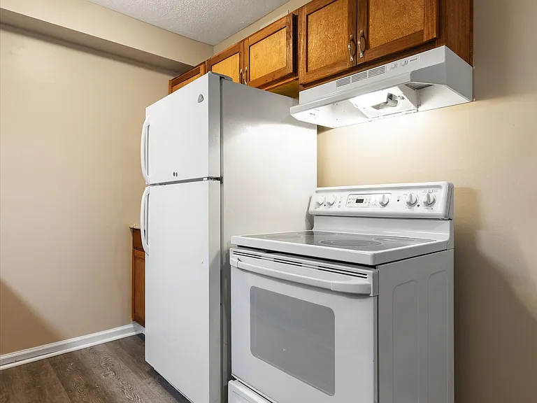 Eat-In Kitchen with Luxury Plank Flooring, Dishwasher, Fridge and Stove!