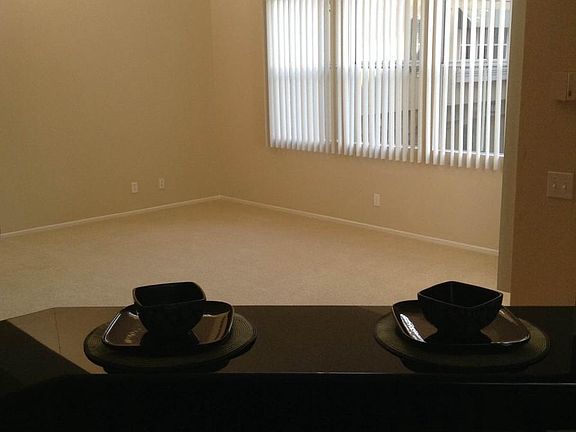 View of living room from open kitchen.
