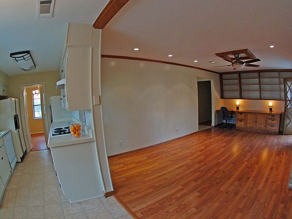 Den with Built-Ins & Kitchen