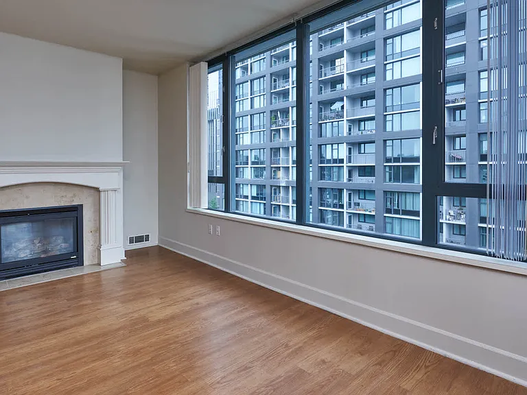 Living Room with Fireplace and Hard Surface Flooring