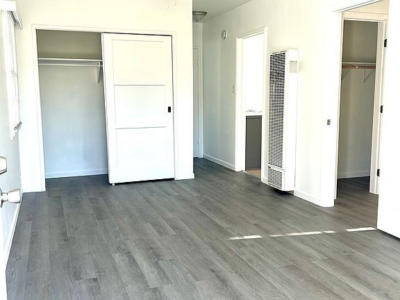 Light, bright unit with new floors, updated plumbing and electrical, tons of storage, oversized closets, bedroom that fits up to a king sized bed, and ONLY ONE SHARED WALL - practically like having your own home!