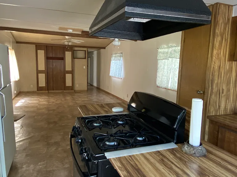 Looking from kitchen into living room