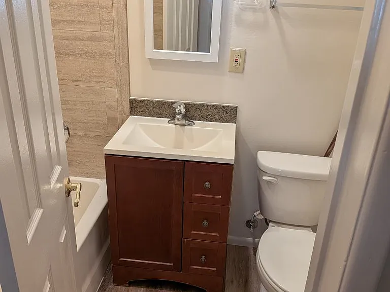 bathroom with new floor & shower walls
