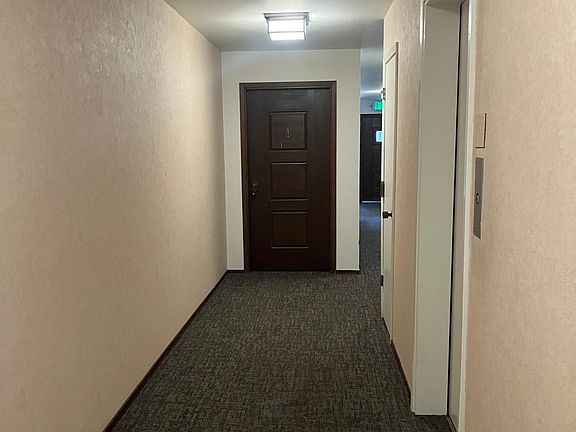 The hallway leading to unit