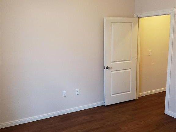 Front bedroom with spacious closet looks out to the front of this cute bungalow. Ceiling fan for added energy efficiency